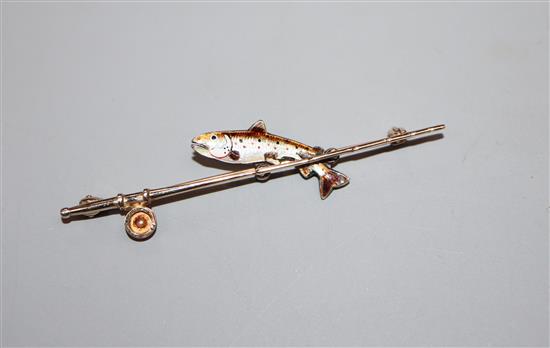 An early 20th century 9ct, silver and enamel trout and fishing rod bar brooch, 62mm.